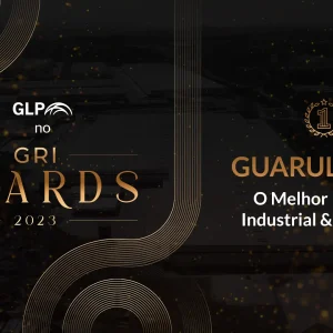 Imagem com fundo preto e detalhes dourados com o texto "GLP no GRI Awards 2023" e "Guarulhos II - O Melhor Projeto Industrial & Logístico"
